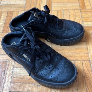 Puma black slip on sneakers